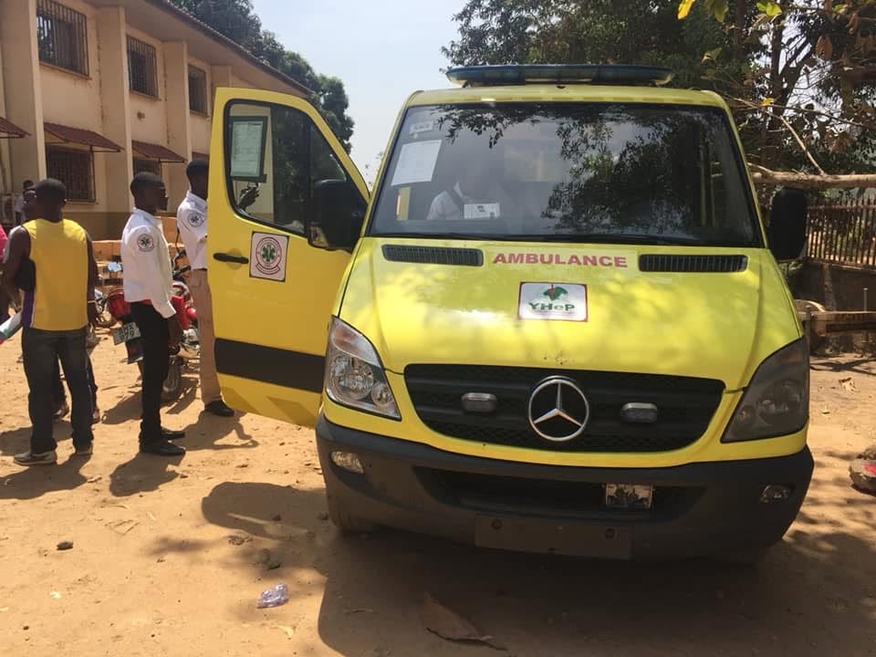 The president of Yhep is presenting Ambulance to a local community hospital in Sierra Leone.